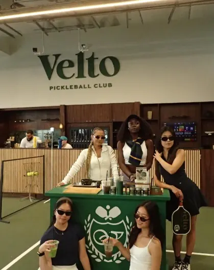 Guests at the branded matcha activation cart