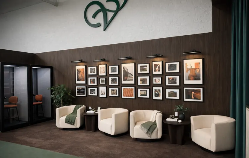 Lounge armchairs beneath the Velto crest